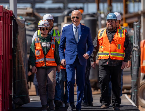 President Joe Biden addresses UAW members walking a picket line at the GM Willow Run Distribution Center, Tuesday, September 26, 2023, in Belleville, Michigan.